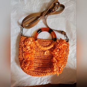 Orange rattan purse with pleather strap